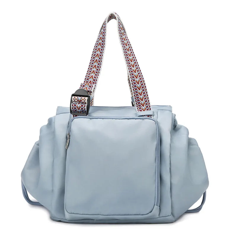 Sac à dos à langer 3 en 1 bleu sur fond blanc