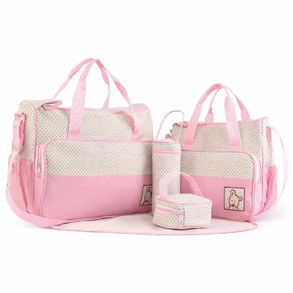 Set sac à langer 5 pièces rose et beige à pois : 2 sacs, pochette, porte-biberon et tapis à langer sur fond blanc