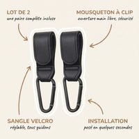 Lot de 2 crochets attaches poussette noirs effet cuir avec sangle velcro réglable 
et mousqueton à clip sécurisé, compatibles tous guidons de poussette — 
infographie fonctionnalités produit