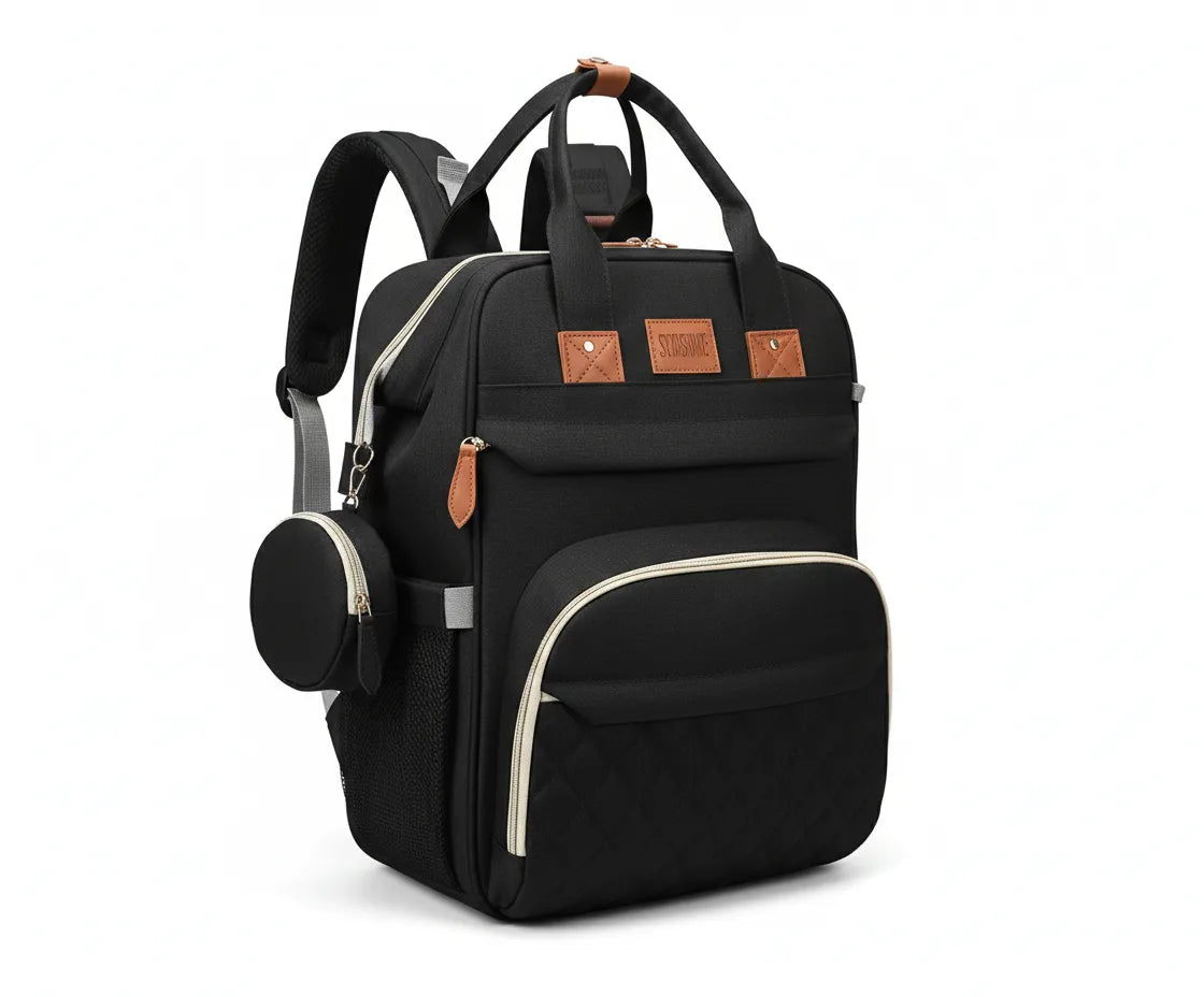 Sac à dos à langer noir multifonction avec port USB externe pour recharge téléphone, finitions effet cuir et poches isothermes.
