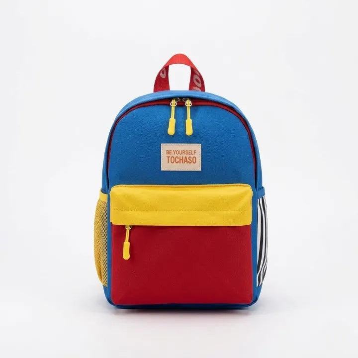 Sac à dos enfant Tochaso colorblock bleu royal, jaune et rouge avec zips dorés et poignée rouge, vue de face