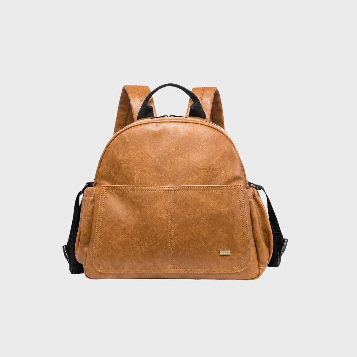 Sac à dos à langer cuir vieilli sur fond gris