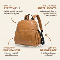 Sac à dos à langer en cuir PU camel à finition patinée effet vieilli avec annotations indiquant l'organisation intelligente avec poche frontale large et poches latérales pour biberons, le transport polyvalent avec sangles poussette amovibles et le confort de portage avec bretelles rembourrées