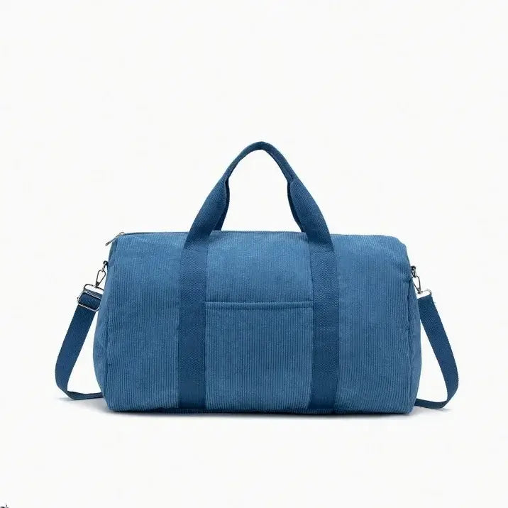 Sac à langer en velours côtelé bleu pétrole avec bandoulière réglable à mousquetons, poignées rigides et poche extérieure - format tote bag spacieux et élégant