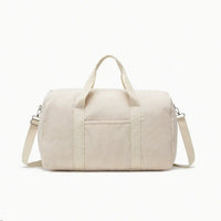 Sac à langer tote bag velours côtelé crème épuré avec poignées et bandoulière amovible, vue de face