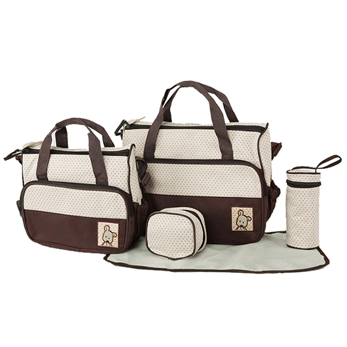 Set sac à langer 5 pièces beige à pois marron : 2 sacs, pochette, porte-biberon et tapis à langer sur fond blanc