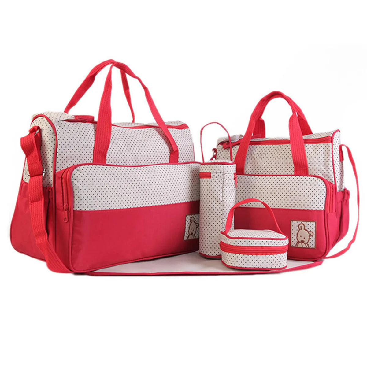 Set sac à langer 5 pièces beige à pois rouge : 2 sacs, pochette, porte-biberon et tapis à langer sur fond blanc