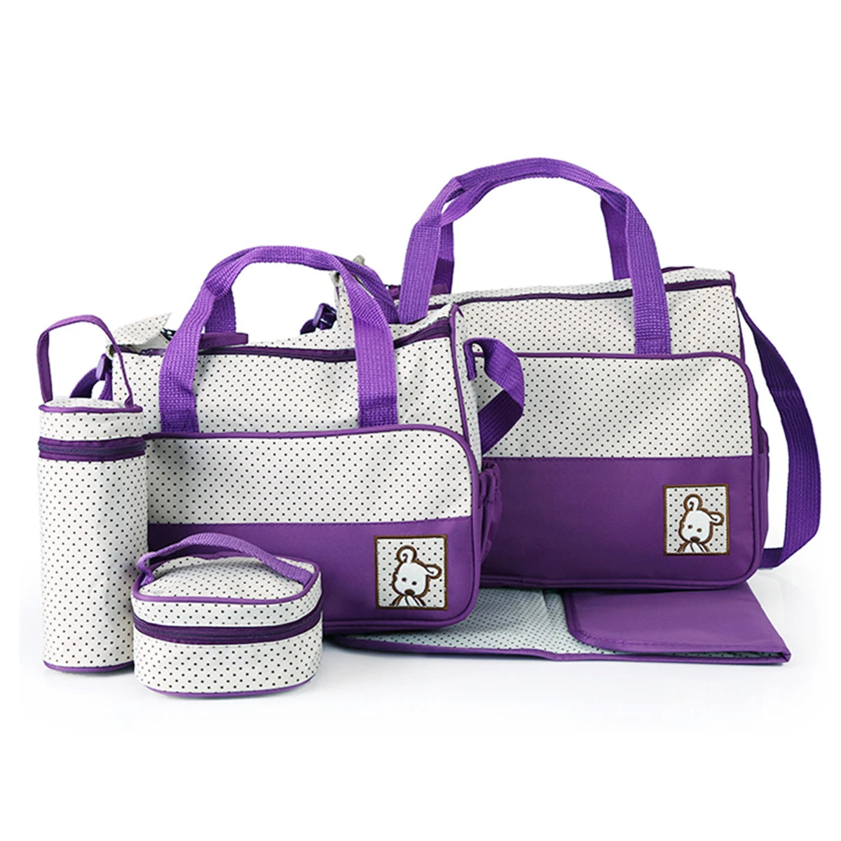 Set sac à langer 5 pièces beige à pois violet : 2 sacs, pochette, porte-biberon et tapis à langer sur fond blanc