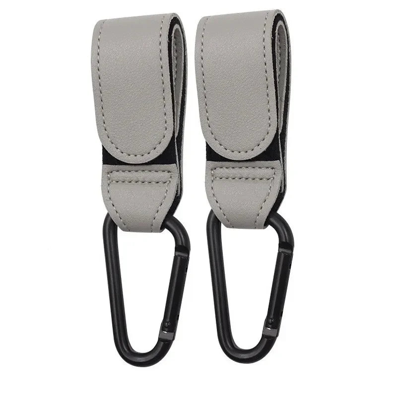 attaches poussettes gris sur fond blanc