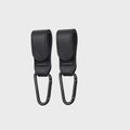 attaches poussettes noir sur fond blanc