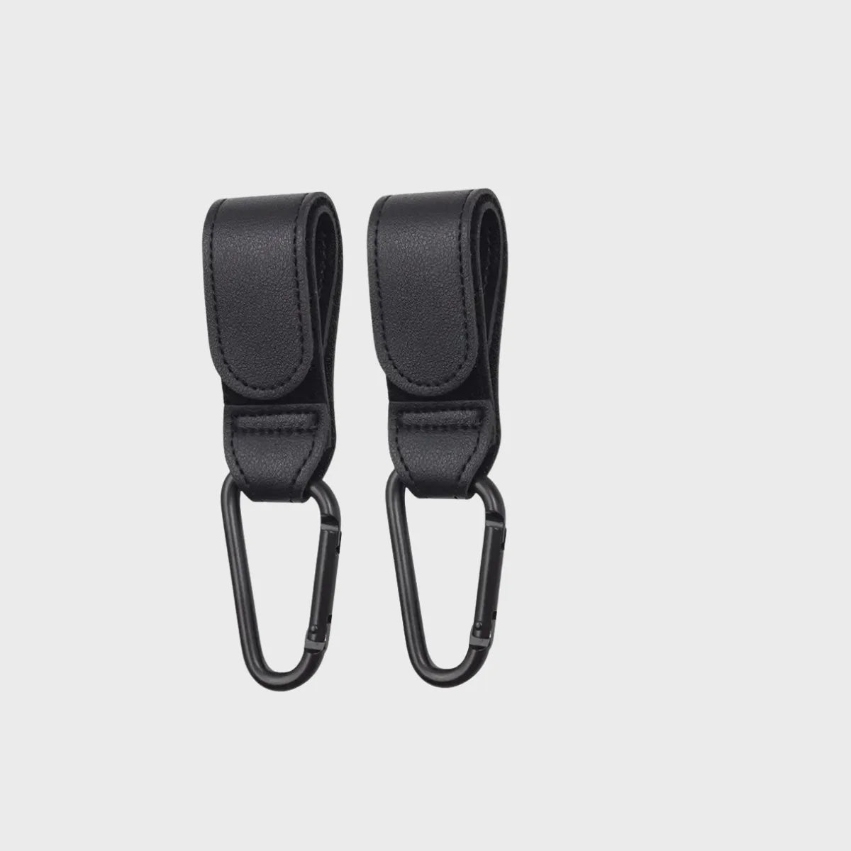 attaches poussettes noir sur fond blanc