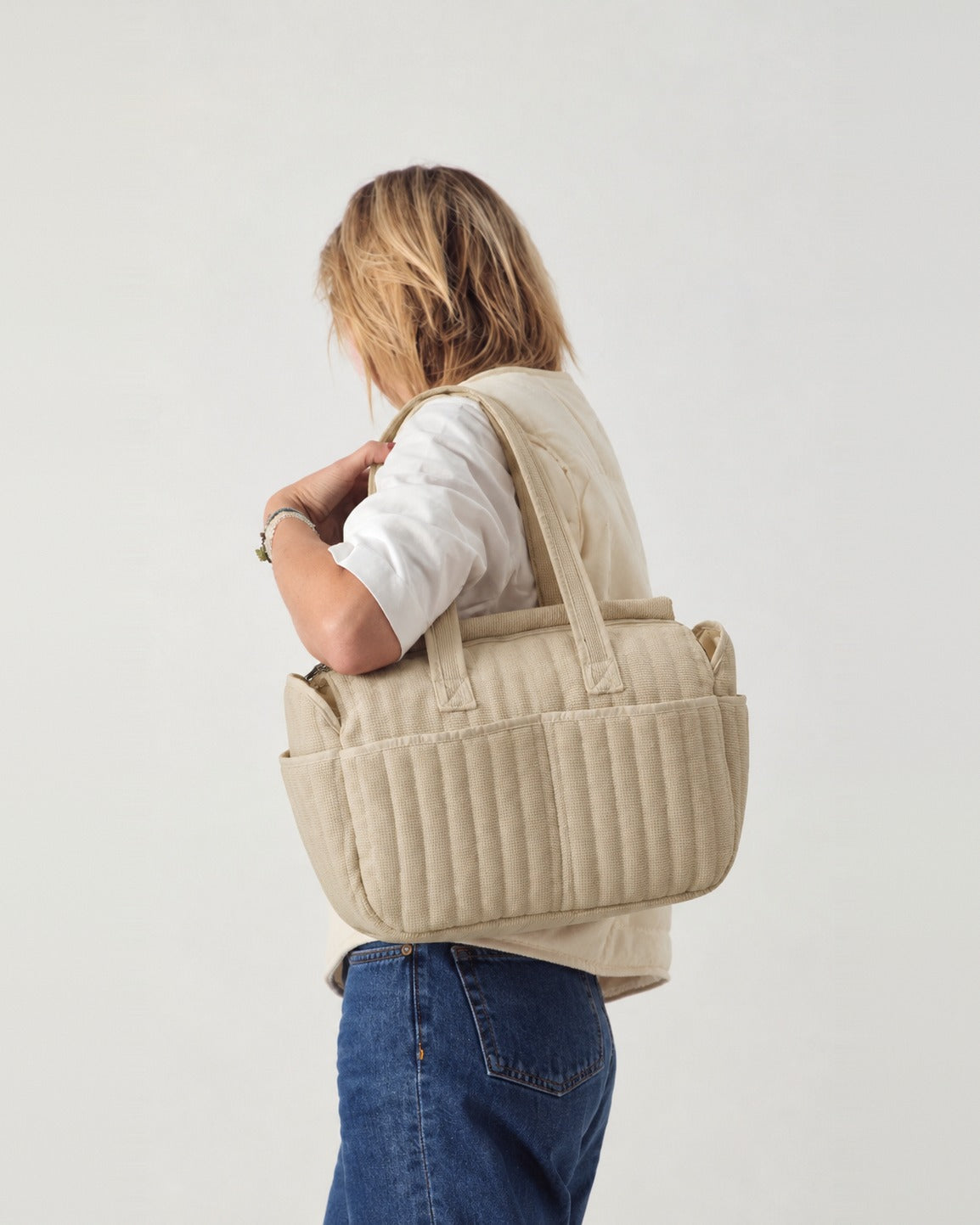 Sac à langer porté à l'épaule
