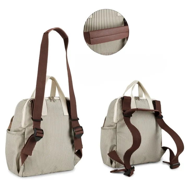 Sac à dos à langer rayé vu de face et de dos avec bretelles réglables marron et détail poignée cuir PU