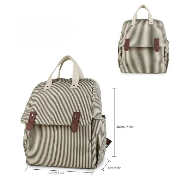 Sac à dos à langer rayé en polyester avec dimensions 30x38x15 cm et détails des poignées cuir PU