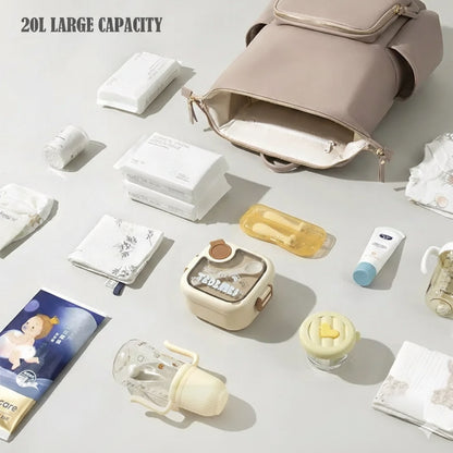 infographie montrant la capacité de 20L du sac à dos à langer