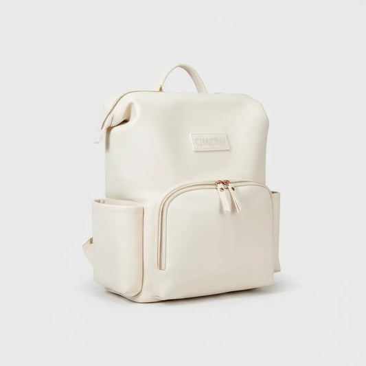 sac à dos à langer en cuir blanc sur fond blanc