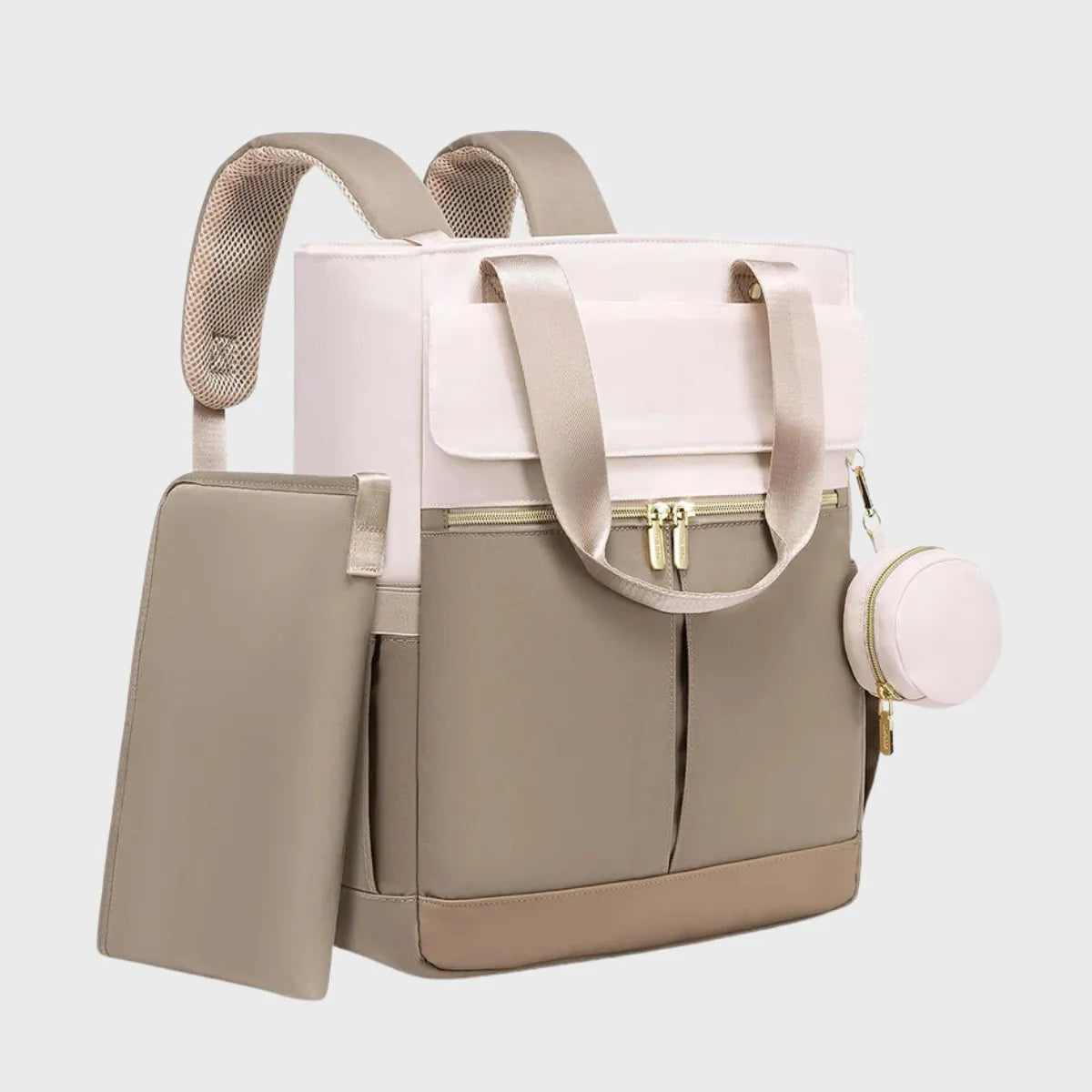 sac a dos a langer beige et blanc ergonomique sur fond gris