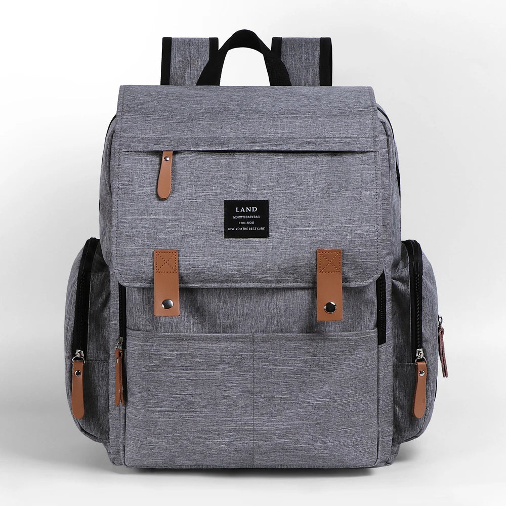 sac_a_dos_a_langer_gris_impermeable sur fond blanc