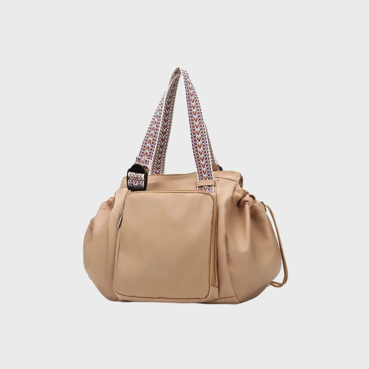 sac a langer couleur camel cafe sur fond gris