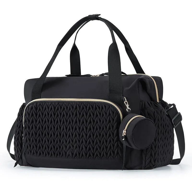 sac à langer grande capacité noir sur fond blanc