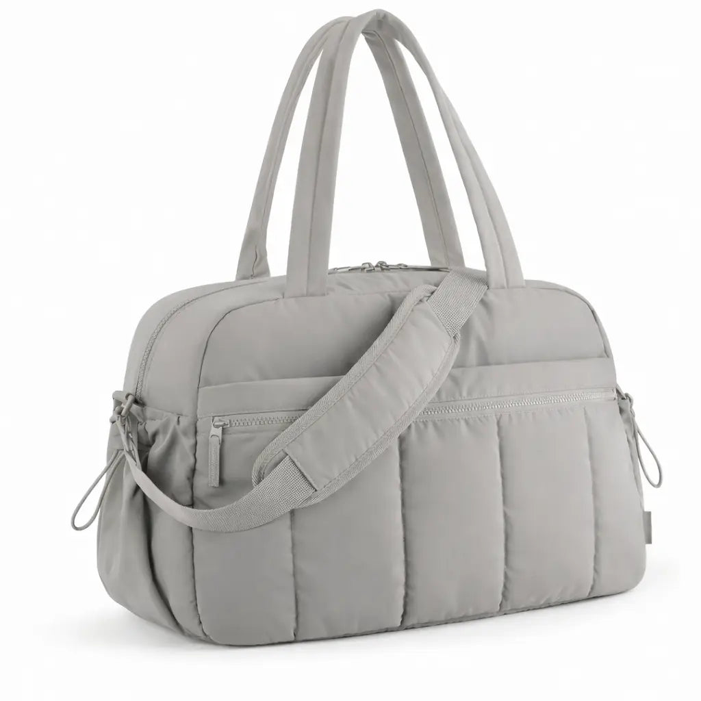 Sac à langer bandoulière gris en nylon, format compact avec poignées doubles et sangle amovible