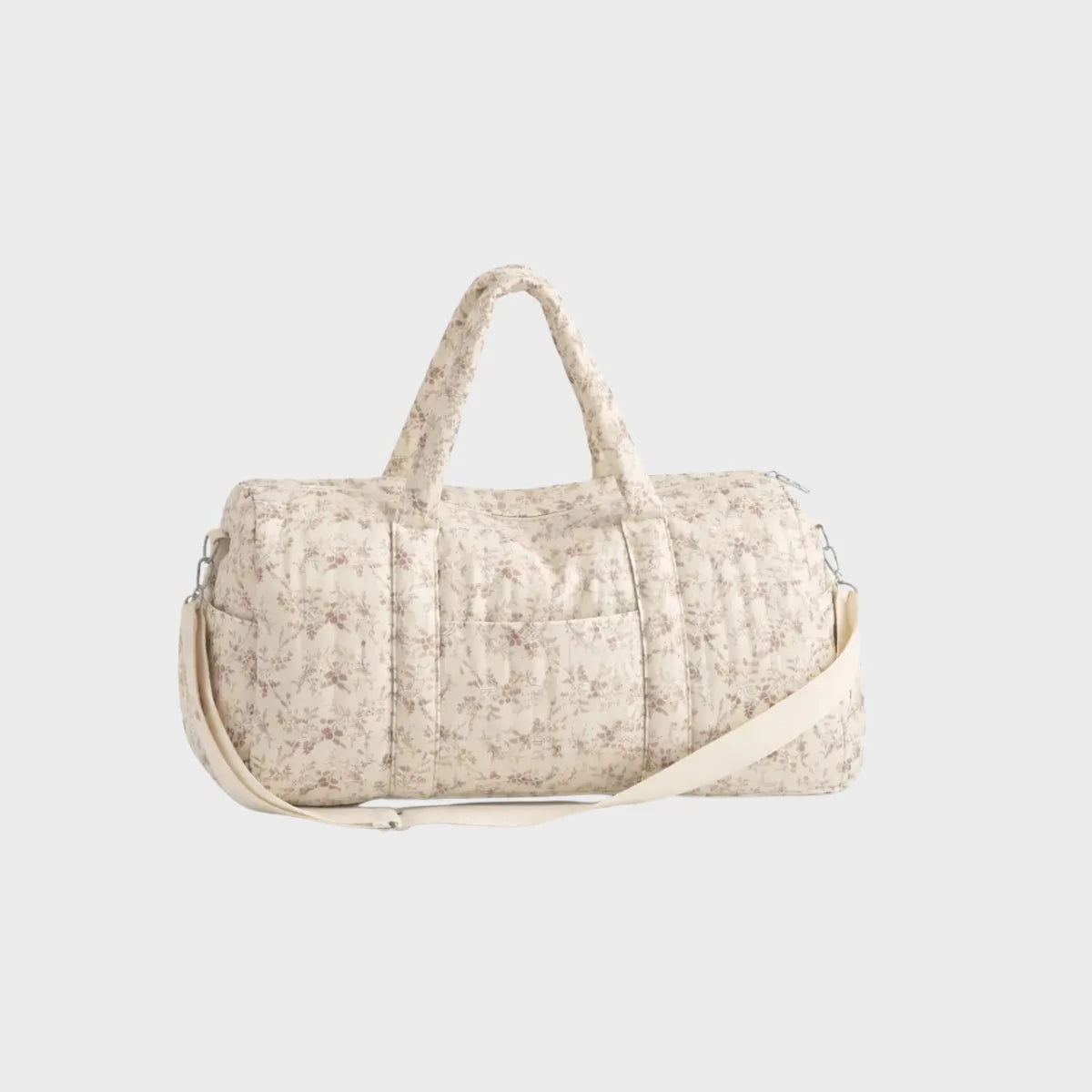 sac à langer fleuri gaze de coton sur fond blanc